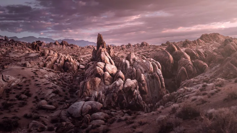 A stunning 4K wallpaper featuring the breathtaking landscape scenery of Alabama Hills in California. This nature-inspired wallpaper showcases the majestic mountains and rock formations that make up the unique and beautiful terrain of the desert region.