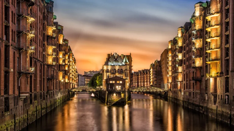 Experience the beauty of Hamburg's stunning architecture and breathtaking landscape with this 4K wallpaper. This stunning cityscape features magnificent buildings and scenic views, making it the perfect addition to any urban traveler's collection.