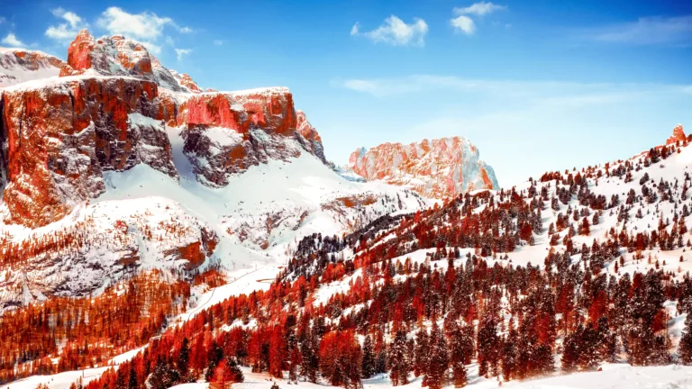 Experience the breathtaking beauty of the Dolomites mountain range with this stunning 4K wallpaper. Featuring a serene landscape scenery, this outdoor wallpaper captures the essence of nature in its purest form.