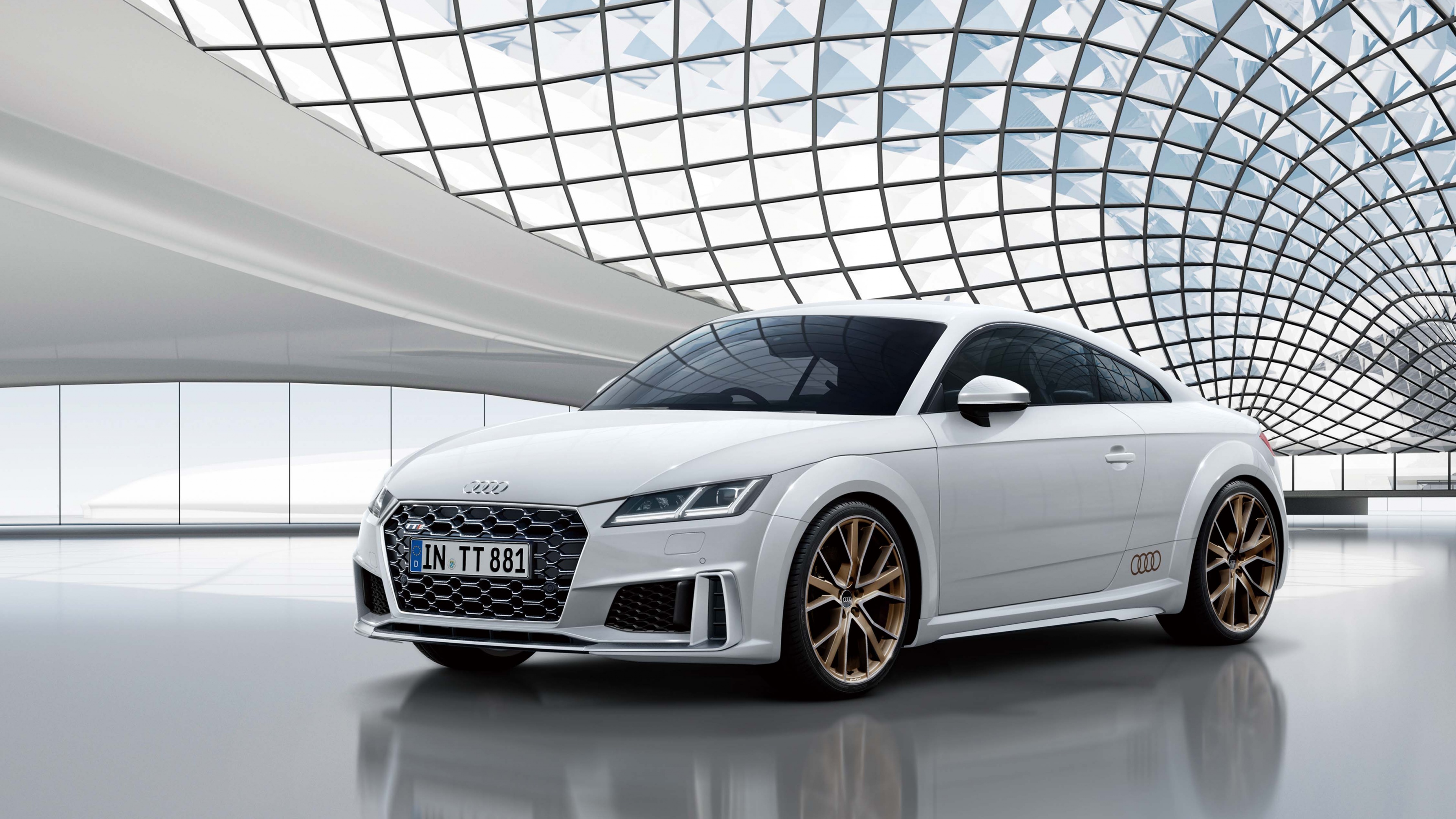 A captivating 4k wallpaper showcasing the Audi TTS Coupe. This sports car combines speed and luxury with its sleek design, making it a remarkable vehicle for automotive enthusiasts.