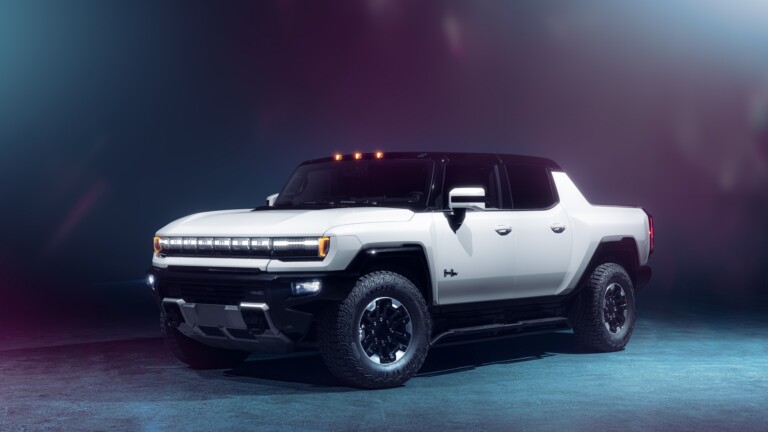 A stunning 4k wallpaper featuring the Hummer EV, an electric vehicle known for its luxury, power, and off-road capabilities. This futuristic high-performance car showcases cutting-edge technology and is perfect for automotive enthusiasts.
