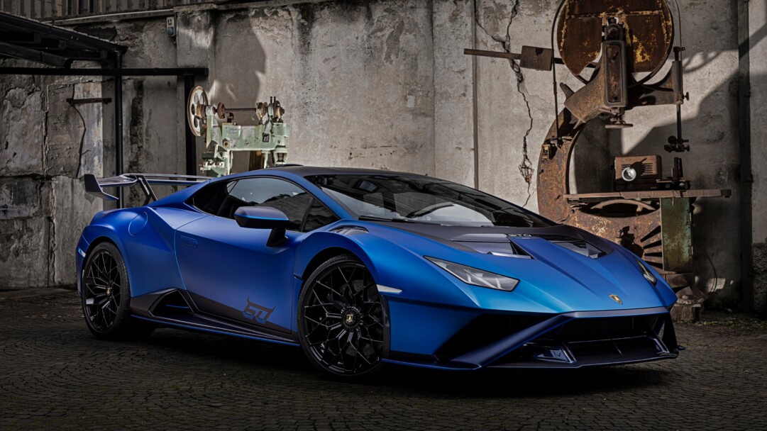 This stunning 4K wallpaper showcases the Lamborghini Huracán STO, a powerful and sleek sports car designed for speed and performance.