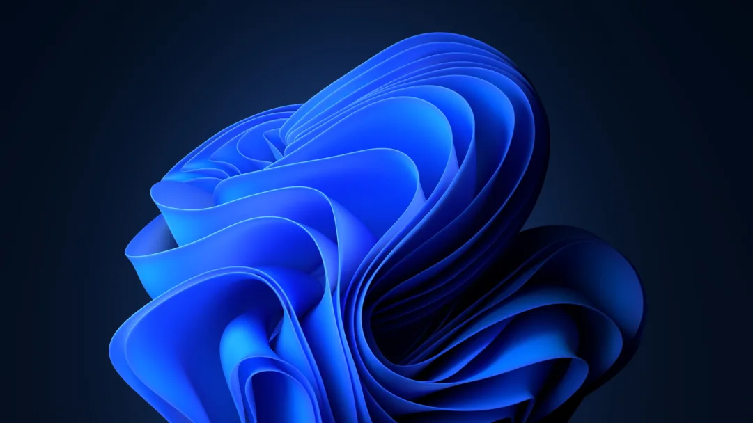 A captivating abstract dark blue bloom wallpaper for Windows 11 in stunning 4K resolution. Enhance your desktop with this artistic and visually striking background featuring intricate designs and deep blue hues.