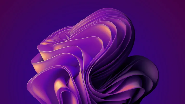 A visually striking 4K Windows 11 wallpaper featuring an abstract gradient design in shades of purple, creating a vibrant bloom effect. Ideal for desktop backgrounds and adding a pop of color to your screen.
