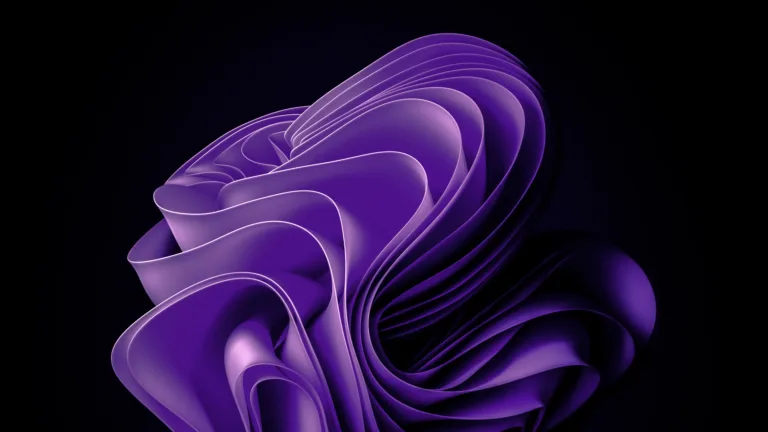 An abstract purple bloom wallpaper in 4K resolution. This vibrant and scenic digital art showcases the beauty of Windows 11.