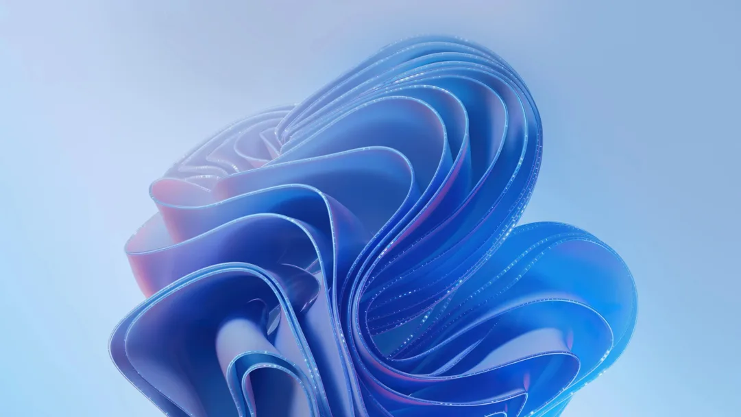 A visually captivating 4K wallpaper showcasing an abstract blue bloom design for Windows 365. Enhance your desktop with this mesmerizing wallpaper featuring vibrant blue tones and an artistic abstract composition.