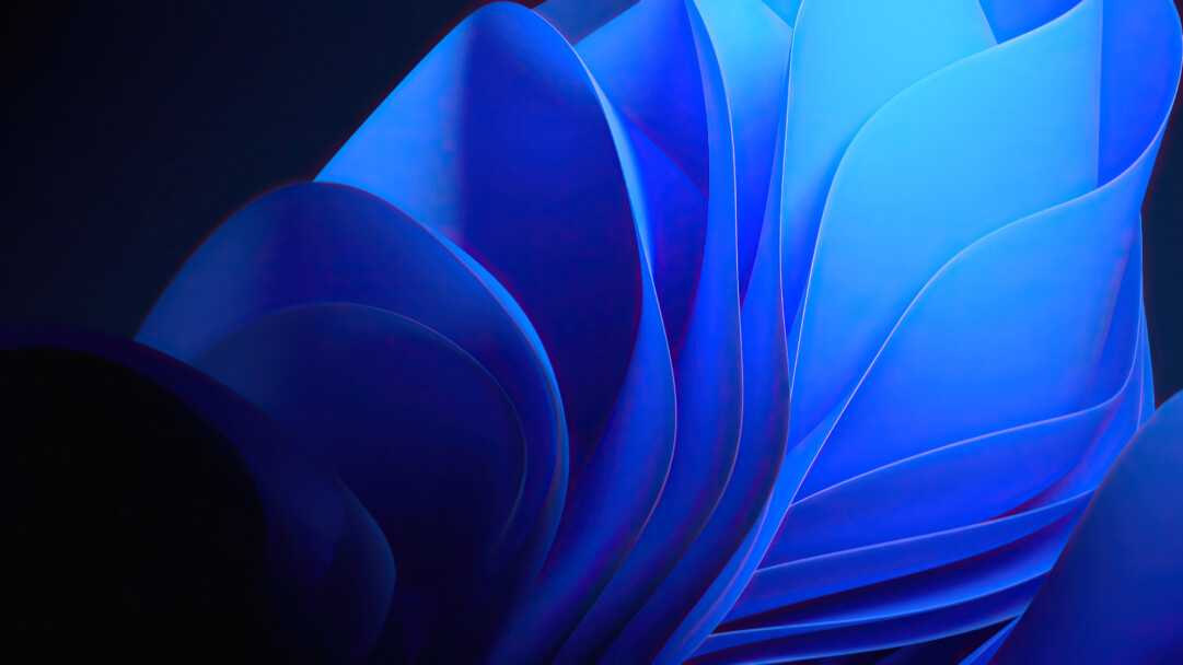 An eye-catching abstract blue background with a futuristic touch, perfect as a 4K wallpaper for Windows 11. This vibrant digital art showcases a modern and geometric design, adding a stylish touch to your desktop.
