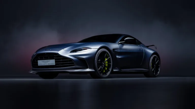 A high-quality 4K wallpaper featuring the iconic Aston Martin Vantage, a luxury sports car known for its sleek and elegant design, perfect for car enthusiasts and luxury car lovers.