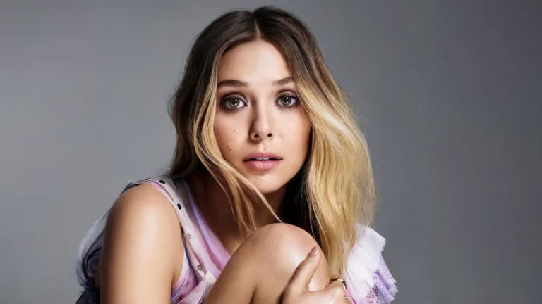 A mesmerizing 4K wallpaper showcasing Elizabeth Olsen, the accomplished actress and Hollywood celebrity, capturing her beauty and presence, perfect for fans and admirers of her work and captivating performances.
