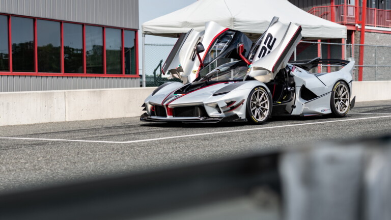A high-resolution 4K wallpaper featuring the dynamic Ferrari FXX-K Evo, an exceptional sports car known for its superb performance and sleek design.