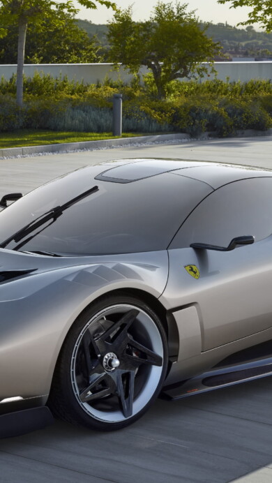 A dynamic 4K wallpaper featuring the Ferrari KC23, a luxurious and high-speed sports car, showcasing its iconic design and vibrant red color, perfect for car enthusiasts and admirers of speed and elegance.