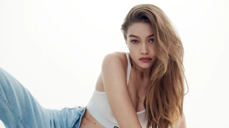 A stunning 4K wallpaper featuring Gigi Hadid, the renowned fashion model and celebrity, capturing her beauty and influence in the world of fashion and entertainment, perfect for fans and admirers of her unique style.