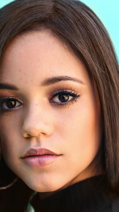 A high-quality 4K wallpaper capturing the essence of Jenna Ortega, a talented young actress, perfect for enthusiasts of her acting skills and captivating celebrity presence.