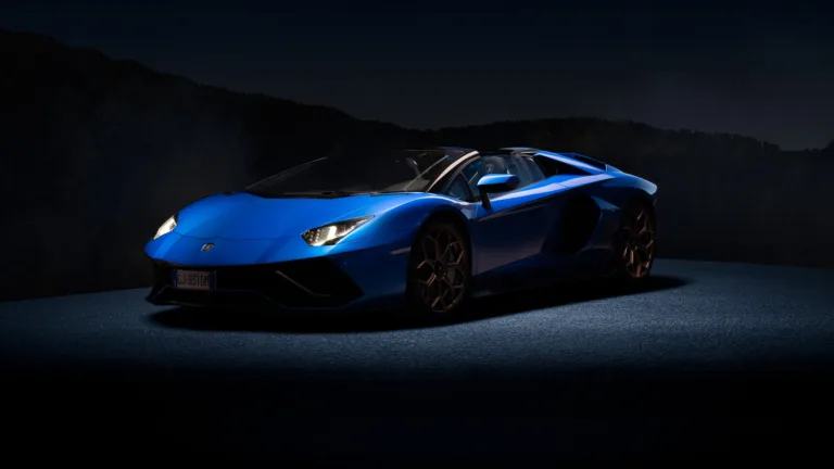 A striking 4K wallpaper featuring the Lamborghini Aventador Ultimae Roadster, an epitome of luxury and speed, set against a stunning backdrop, perfect for car enthusiasts and admirers of exquisite automotive design.