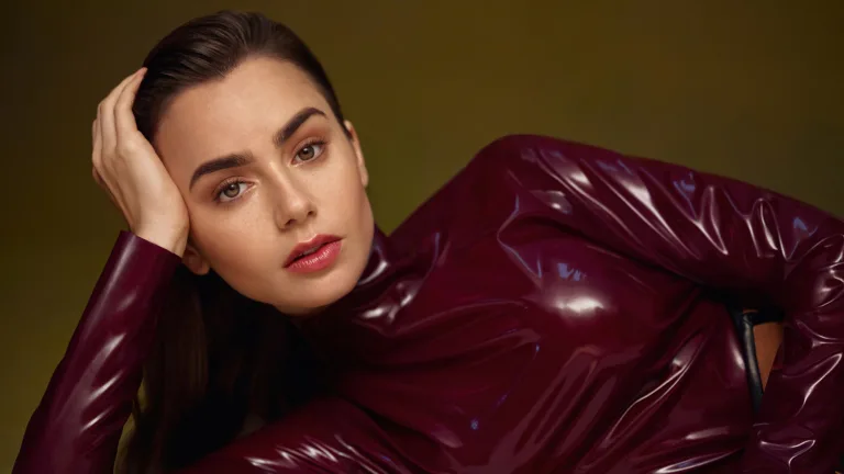 A captivating 4K wallpaper showcasing Lily Collins in a Vogue photoshoot, highlighting the actress's elegance and fashion sense, perfect for fans and admirers of her talent and style.