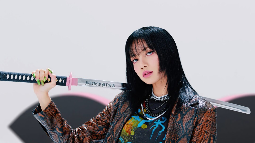 A high-quality 4K wallpaper capturing the charisma of Lisa from BLACKPINK, a talented K-pop idol and singer, perfect for fans of K-pop and captivating celebrity presence.
