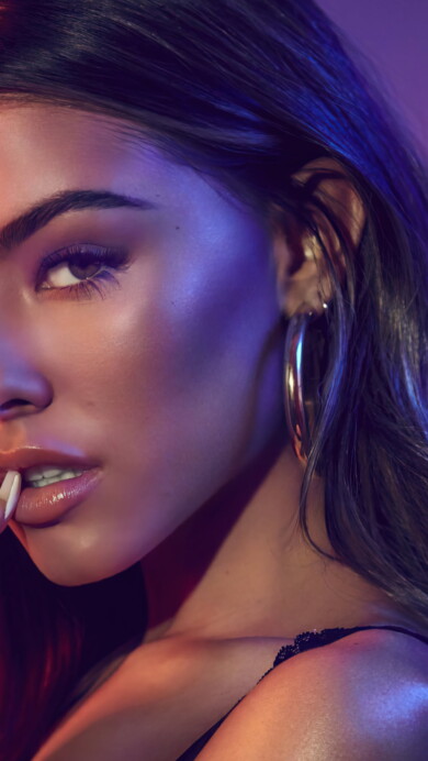 A high-quality 4K wallpaper featuring the artistic essence of Madison Beer, a talented singer and music artist, perfect for enthusiasts of both music and celebrity allure.