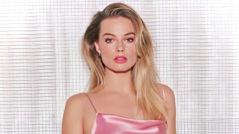 An enchanting 4K wallpaper featuring Margot Robbie, a talented actress and Hollywood celebrity, capturing her beauty and charm, perfect for fans and admirers of her work and iconic roles.