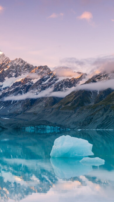 Immerse yourself in the serene beauty of Aoraki Mount Cook National Park in New Zealand with this captivating 4K wallpaper. The majestic Southern Alps and the tranquil landscape create a breathtaking and scenic escape. Perfect for travelers and those seeking a desktop background that captures the natural wonder and alpine serenity of this iconic national park.
