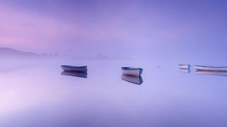 Immerse yourself in the serene beauty of Loch Rusky in the Scottish Highlands with this captivating 4K wallpaper. The tranquil lake, surrounded by the stunning landscape of Scotland, offers a scenic and peaceful escape. Perfect for travelers and those seeking a desktop background that captures the natural tranquility and rugged beauty of this Scottish gem.