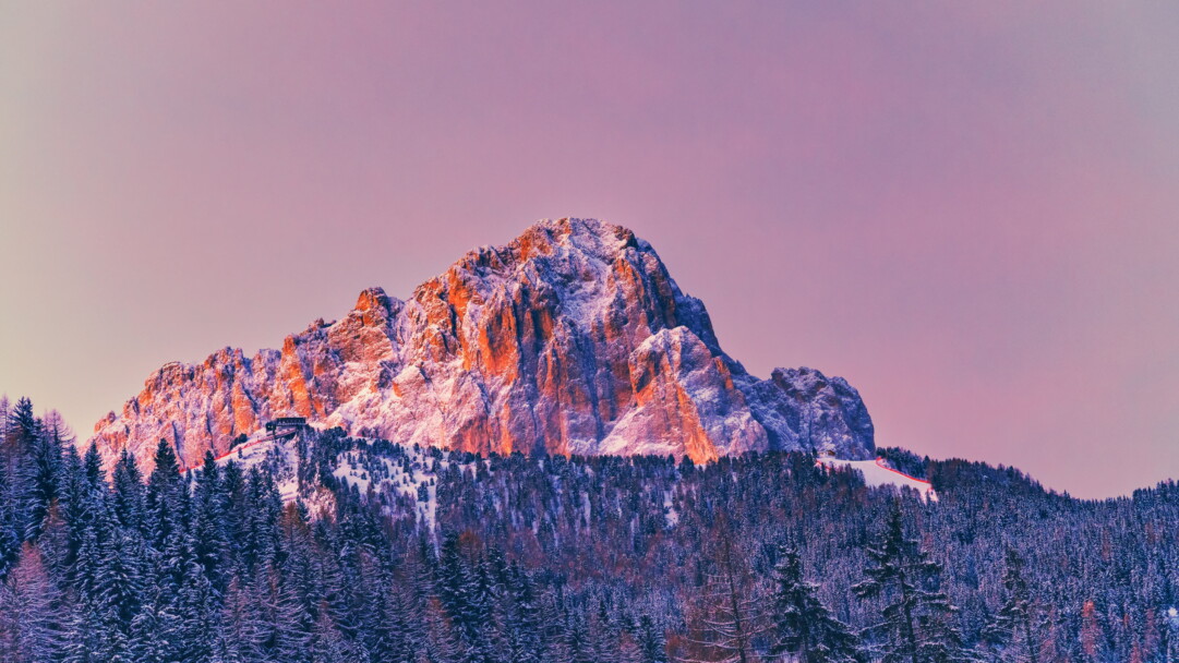 Experience the awe-inspiring majesty of a mountain peak with this stunning 4K wallpaper. The rugged wilderness and snowcapped beauty of this landscape create a truly majestic scene. Perfect for nature enthusiasts and adventure seekers looking for a captivating and scenic desktop background.