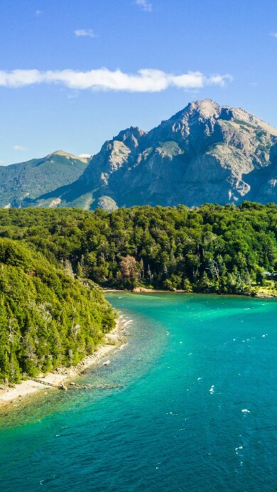 Journey to the pristine beauty of Nahuel Huapi Lake in Argentina's Patagonia region with this mesmerizing 4K wallpaper. Set against the backdrop of the Andes Mountains, the lake offers a serene and scenic escape. Ideal for travelers and those seeking a desktop background that captures the natural tranquility and awe-inspiring landscape of South America.