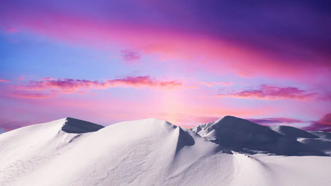 Immerse yourself in the serene beauty of snow-covered mountains with this captivating 4K wallpaper. The tranquil winter landscape, featuring snow-draped peaks and a serene atmosphere, creates a peaceful and scenic escape. Ideal for those who appreciate the beauty of nature in its snowy, tranquil form as a desktop background.