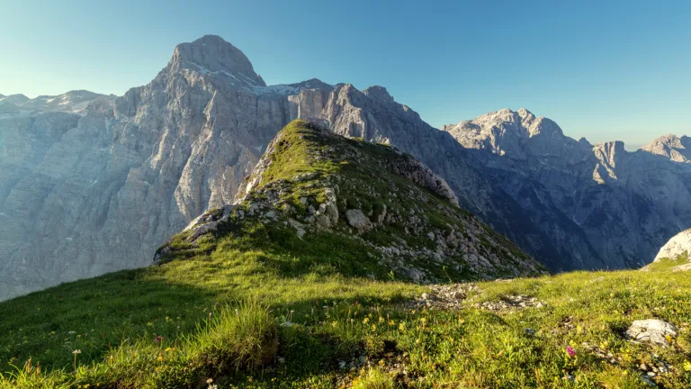 Immerse yourself in the serene beauty of Triglav National Park in Slovenia with this captivating 4K wallpaper. The majestic Julian Alps and the tranquil landscape create a breathtaking and scenic escape. Perfect for travelers and those seeking a desktop background that captures the natural wonder and alpine beauty of this European national park.