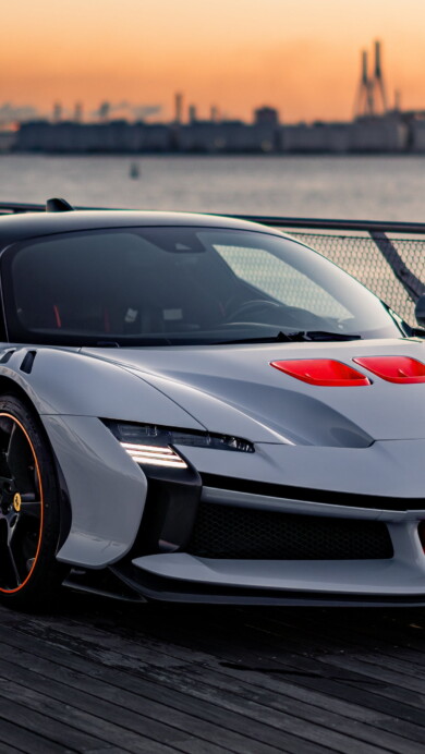 A breathtaking 4K wallpaper showcasing the Ferrari SF90 XX Stradale, an epitome of high performance and luxury. This supercar, with its striking red color and exquisite design, is perfect for adorning your desktop or mobile background.