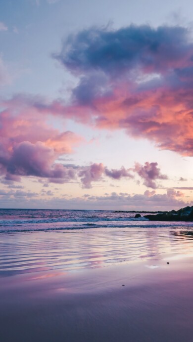 Experience the serene beauty of a Maui beach sunset with this stunning 4K wallpaper. Set against the backdrop of Hawaii's natural splendor, it's a perfect choice for your high-resolution desktop background.