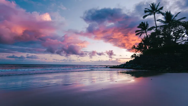 Experience the serene beauty of a Maui beach sunset with this stunning 4K wallpaper. Set against the backdrop of Hawaii's natural splendor, it's a perfect choice for your high-resolution desktop background.