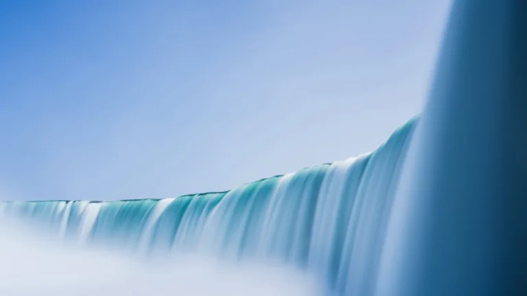Witness the majestic beauty of Niagara Falls in this stunning 4K wallpaper captured with a long exposure technique. Ideal for your high-resolution desktop background, it portrays the natural wonder of this iconic waterfall.