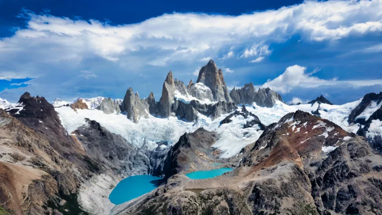 Immerse yourself in the natural beauty of Patagonia with this captivating 4K wallpaper showcasing the iconic Mount Fitz Roy. Located in Argentina's Andes, this image is an ideal choice for your high-resolution desktop background, capturing the breathtaking scenery of the region.