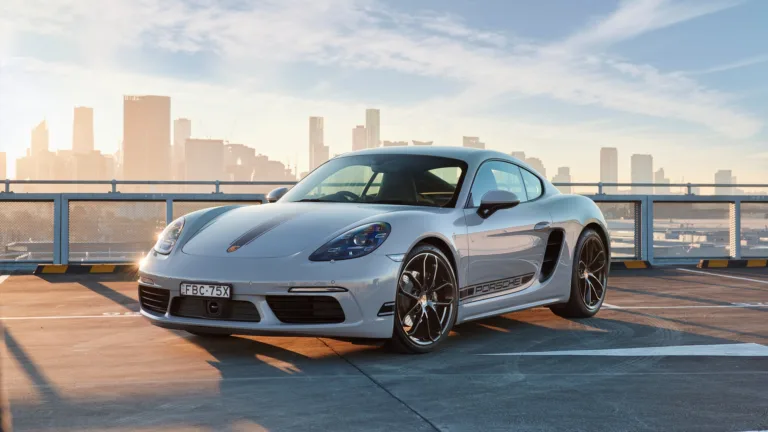 A high-definition 4K wallpaper showcasing the sleek and stylish Porsche 718 Cayman. This wallpaper features the exceptional design and performance of the luxury sports car, perfect for adorning your desktop background.