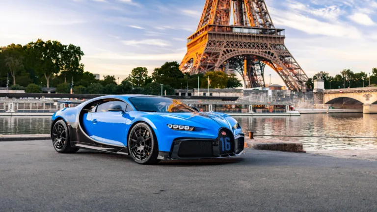 A striking 4K wallpaper showcasing the Bugatti Chiron Pur Sport in Paris. This high-resolution image captures the essence of the luxurious hypercar against a backdrop of the iconic Parisian landscape. Ideal for your desktop or device background.