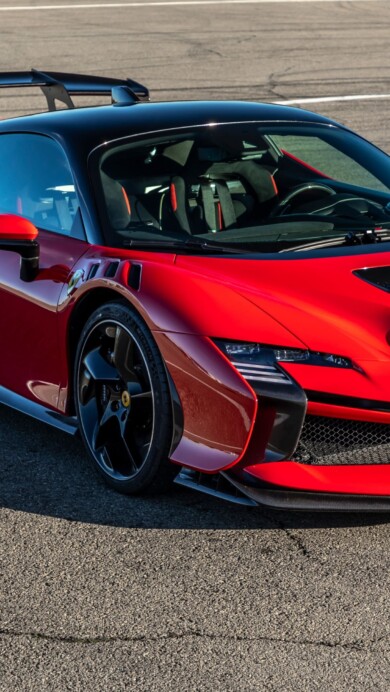 A breathtaking 4K wallpaper showcasing the Ferrari SF90 XX Stradale, a pinnacle of luxury and performance. Adorn your screen with the high-resolution image of this Italian masterpiece, capturing the essence of speed, power, and automotive design.