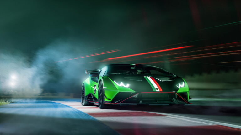 A dynamic 4K wallpaper featuring the exclusive Lamborghini Huracán STO Anniversary Edition. Revel in the high-resolution beauty of this limited celebratory model from Lamborghini, showcasing its stunning design and power without compromise. Ideal for your wallpaper collection.