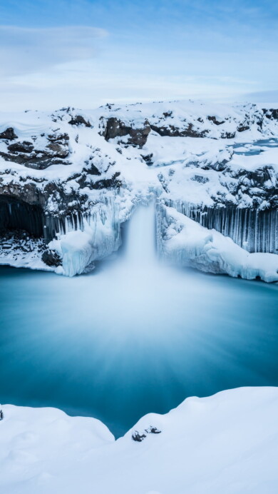 Immerse yourself in the breathtaking beauty of Aldeyjarfoss Waterfall in Iceland through this 4K wallpaper. With its majestic cascading waters against a stunning natural backdrop, this wallpaper showcases the scenic allure of this Icelandic gem in high resolution.