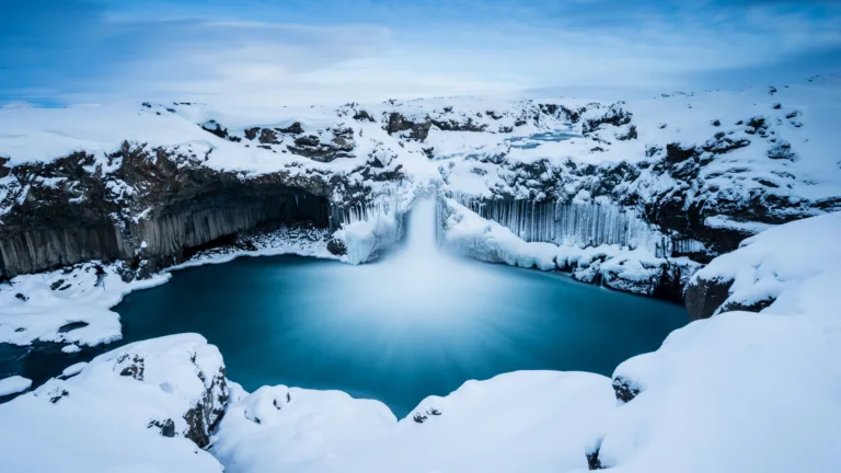 Immerse yourself in the breathtaking beauty of Aldeyjarfoss Waterfall in Iceland through this 4K wallpaper. With its majestic cascading waters against a stunning natural backdrop, this wallpaper showcases the scenic allure of this Icelandic gem in high resolution.