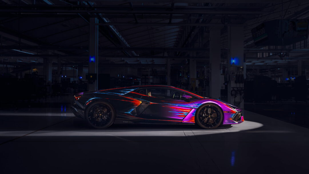 A luxurious 4K wallpaper featuring the Lamborghini Revuelto Opera Unica One Off, a masterpiece in automotive design. The high-resolution image showcases the sleek lines and dynamic features of this unique and rare sports car, making it the perfect choice for your desktop or mobile background.