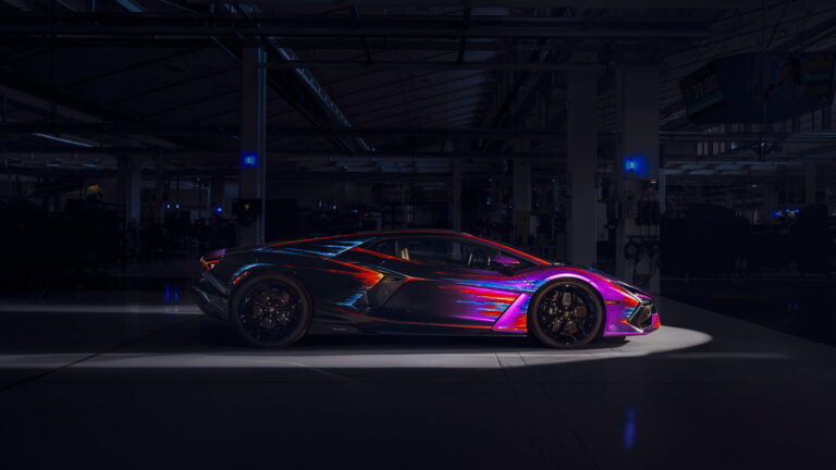 A luxurious 4K wallpaper featuring the Lamborghini Revuelto Opera Unica One Off, a masterpiece in automotive design. The high-resolution image showcases the sleek lines and dynamic features of this unique and rare sports car, making it the perfect choice for your desktop or mobile background.
