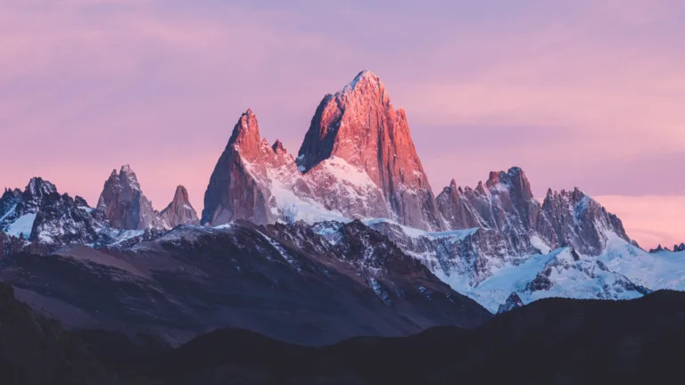 Embrace the awe-inspiring beauty of Mount Fitz Roy in Patagonia, Argentina, through this 4K wallpaper. Showcasing the majestic peaks against the backdrop of scenic landscapes, it captures the breathtaking allure of this iconic mountain in high resolution.