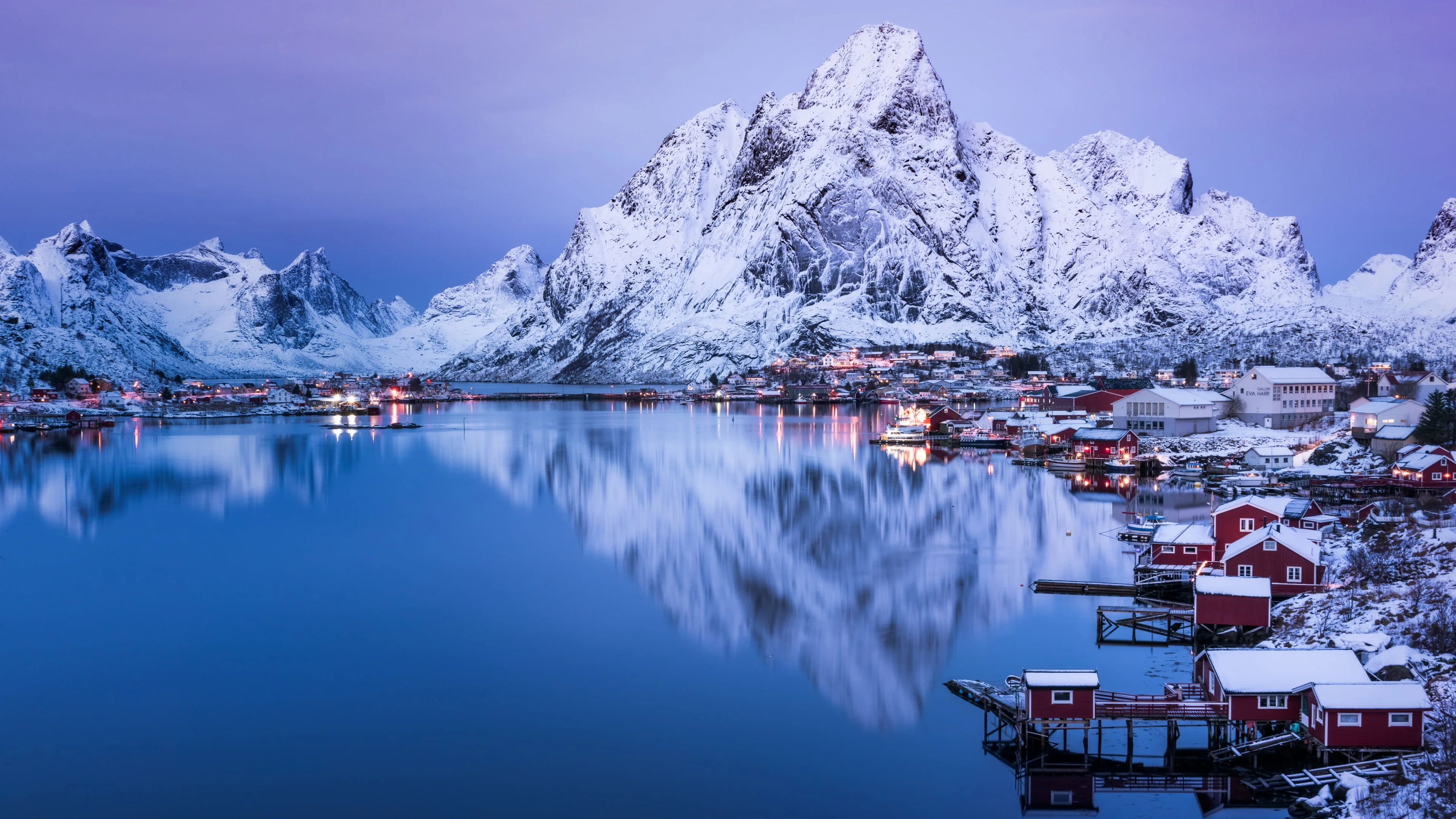 Capture the mesmerizing beauty of the Reine area in the Lofoten Islands, Norway, with this 4K wallpaper. Displaying the stunning landscapes and vibrant coastal scenery, this wallpaper encapsulates the serene charm of the Lofoten Islands, perfect for high-resolution displays.