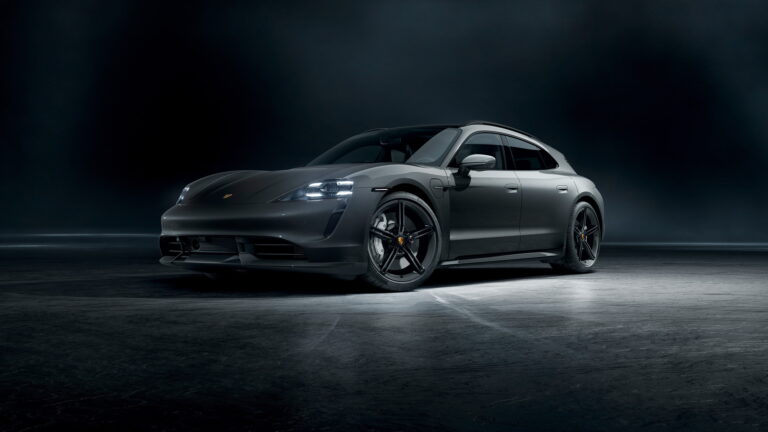 A stunning 4K wallpaper featuring the sleek design of the Porsche Taycan, a luxurious electric sports car. The high-resolution image showcases the cutting-edge automotive performance and design, making it an ideal choice for enthusiasts looking to elevate their desktop or mobile background with a touch of automotive excellence.