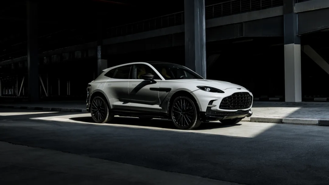 A stunning 4K wallpaper featuring the Aston Martin DBX707, a pinnacle of luxury and performance in the automotive world. The sleek design, powerful presence, and high-resolution details of this sports car make it an ideal choice for your desktop or mobile wallpaper, embodying the epitome of automotive elegance.