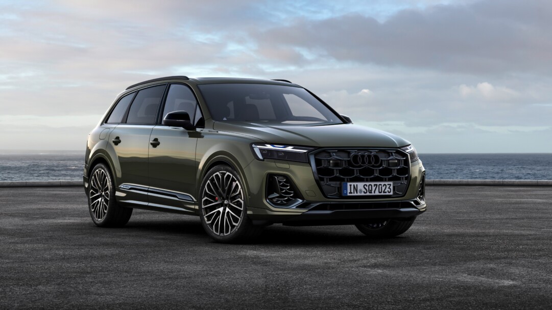 A stunning 4K wallpaper showcasing the Audi SQ7 TFSI 2024, a pinnacle of automotive excellence. The high-resolution image captures the sleek design and performance prowess of this luxury car, making it an ideal choice for your desktop or mobile wallpaper.