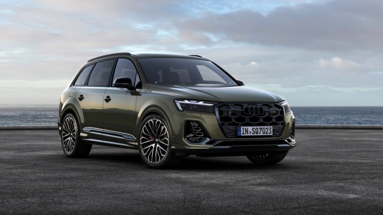 A stunning 4K wallpaper showcasing the Audi SQ7 TFSI 2024, a pinnacle of automotive excellence. The high-resolution image captures the sleek design and performance prowess of this luxury car, making it an ideal choice for your desktop or mobile wallpaper.