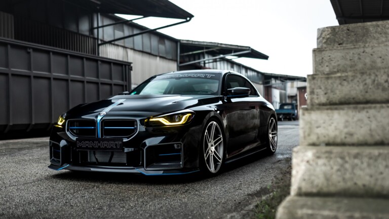 A stunning 4K wallpaper featuring the BMW M2 Manhart MH2 560, a high-performance luxury car. The sleek design and powerful stance of this automotive masterpiece are showcased against a backdrop that accentuates its speed and precision. Ideal for enthusiasts, this wallpaper is perfect for both desktop and mobile displays.