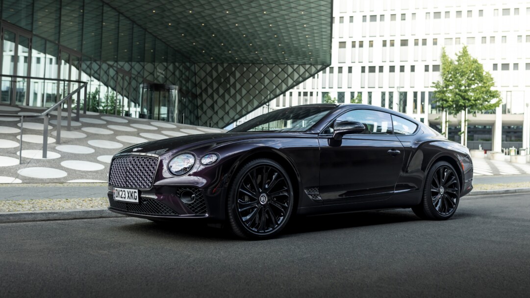sophisticated 4K wallpaper showcasing the luxurious Bentley Continental GT Mulliner. The high-resolution image captures the sleek design and elegance of this exceptional luxury car, making it a perfect choice for your desktop or mobile background.