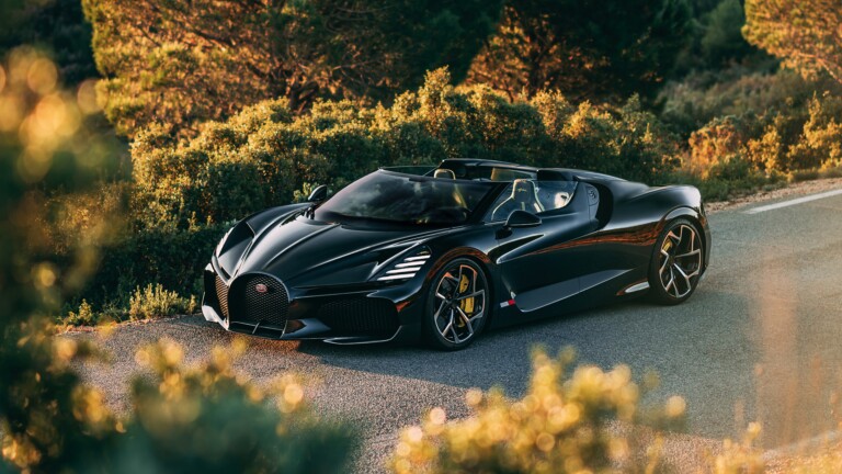 A mesmerizing 4K wallpaper featuring the Bugatti W16 Mistral Roadster, a pinnacle of luxury and high performance. The sleek design, powerful engine, and breathtaking details of this supercar are beautifully showcased in this high-resolution wallpaper, perfect for adorning your desktop or mobile screen with automotive elegance.